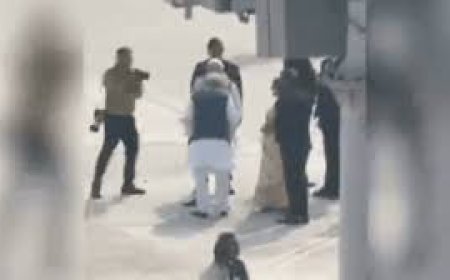 Nitish Kumar Attempts to Touch PM Modi’s Feet at Patna Airport; Viral Moment Marks His 10th Oath as Bihar CM