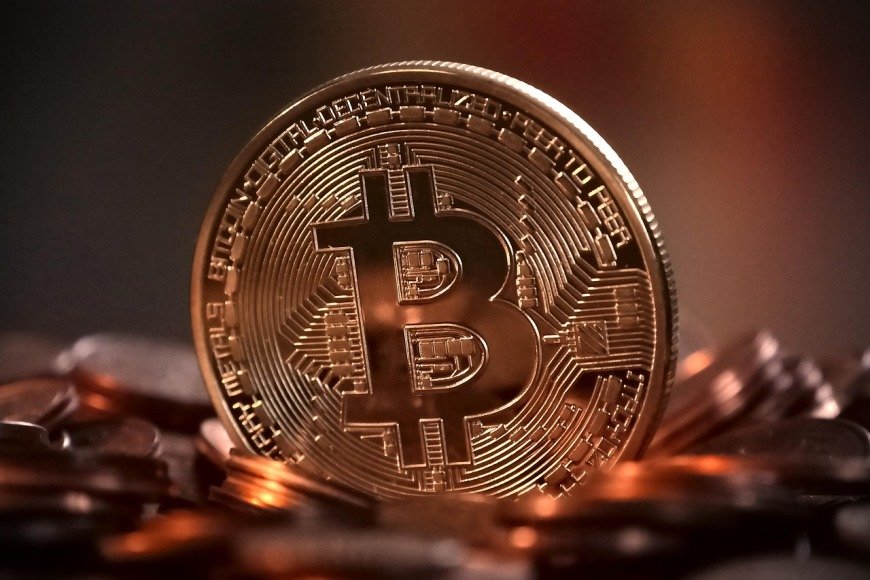 Bitcoin slides below $100,000 for first time since June as risk off mood grips crypto